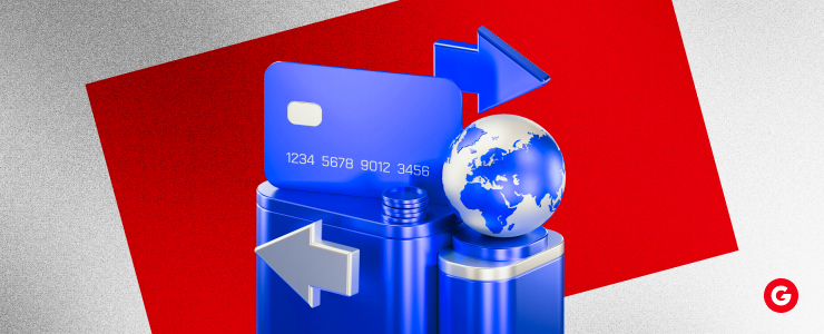 A blue and red computer with a globe positioned on top, symbolizing global connectivity and technology.