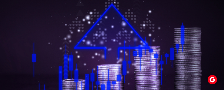 A stack of coins with two blue arrows pointing upward, symbolizing growth or increase in value.